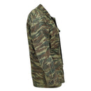 Genuine Greek military jacket in dark lizard camo with reinforced elbows and button closure, durable polycotton blend.