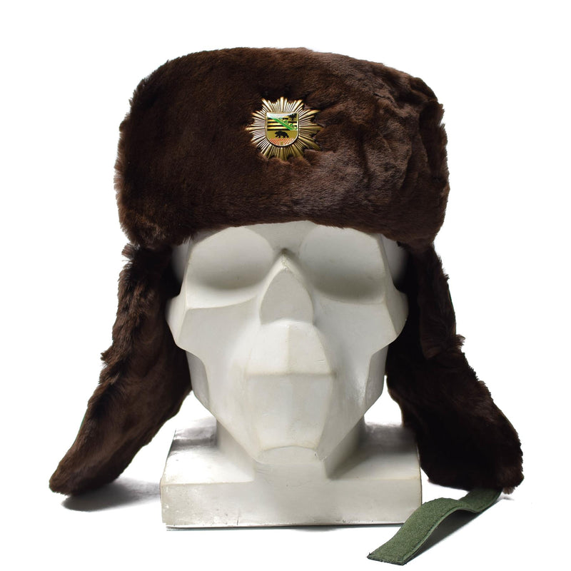 Oryginalna niemiecka policja ciepła zimowa czapka zimna pogoda Faux Fur Ushanka odznaka nowa