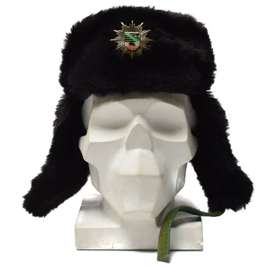 Oryginalna niemiecka policja ciepła zimowa czapka zimna pogoda Faux Fur Ushanka odznaka nowa