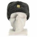 Vintage Genuine Czech army gray ushanka winter hat with gold badge and faux fur lining on white mannequin head