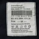 Close-up of a clothing label on a Dutch navy blue coverall showing size 58 and fabric care instructions