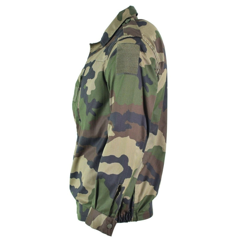 Side view of genuine French army F2 combat jacket in CCE camouflage pattern military surplus new