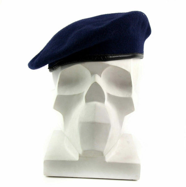 Dark blue German army wool beret with leather trim displayed on a white mannequin head.