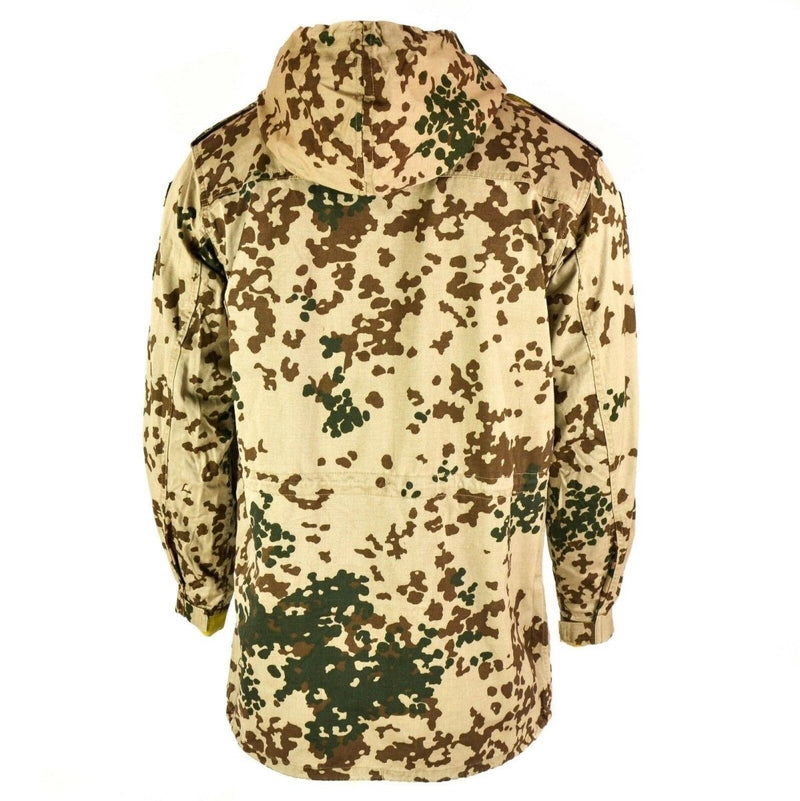 Back view of German army desert flecktarn field jacket parka with hood and adjustable cuffs.