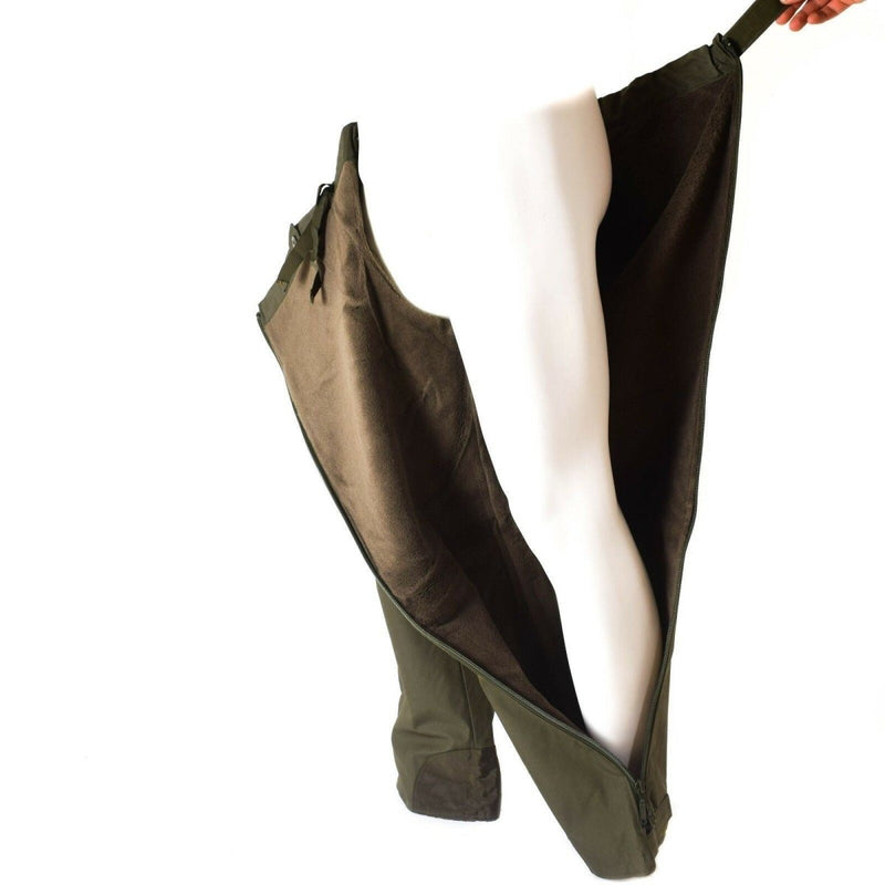 German army OD olive waterproof winter over trousers with full side zipper open on mannequin leg