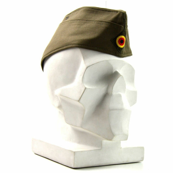 Olive green Genuine German military side cap with roundel insignia on mannequin head side view