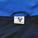 Close-up of the blue and black breathable mesh lining and label inside German Bundeswehr sports jacket size medium.