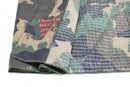 Close-up of Genuine Hungarian Army M90 four-color camouflage military shirt sleeve made of ripstop fabric