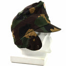 Hungarian camo army winter cap with ear flaps and Hungarian flag badge on front, designed for military use.