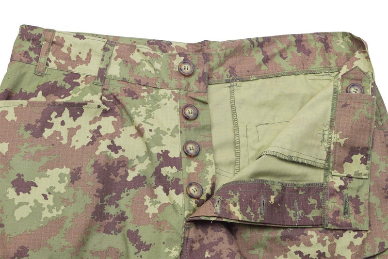Close-up of genuine Italian military camouflage combat pants with button fly and ripstop fabric texture