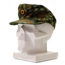 Genuine German army Flecktarn cap in BW woodland camo with classic camouflage design on white mannequin head
