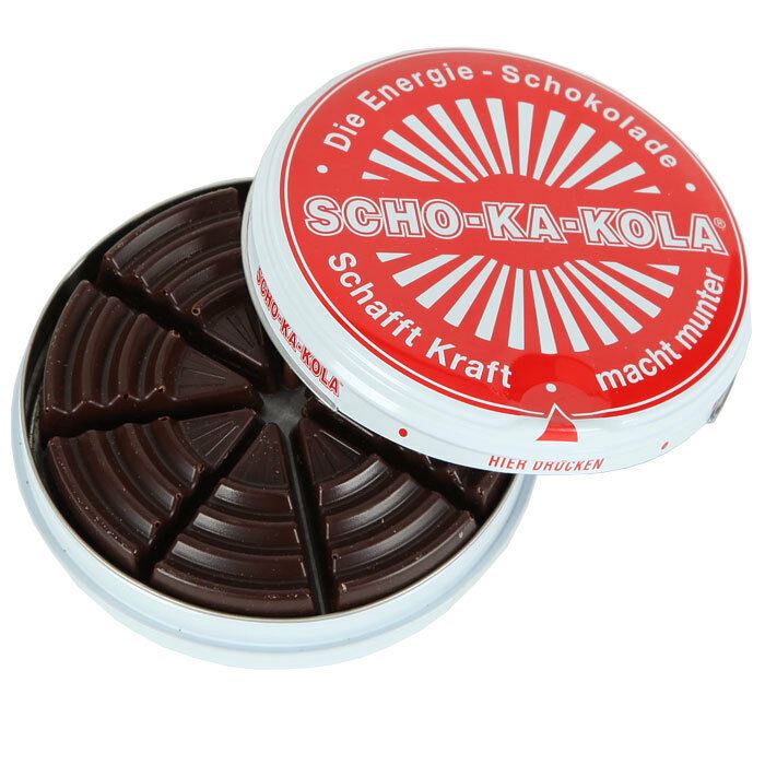 Open tin of German SCHO-KA-KOLA dark chocolate with caffeine and cola nut, shaped in triangular segments