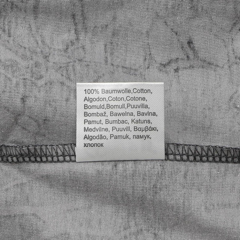 Close-up of a gray fabric label showing 100% cotton material on the MFH U.S. military-style olive undershirt.