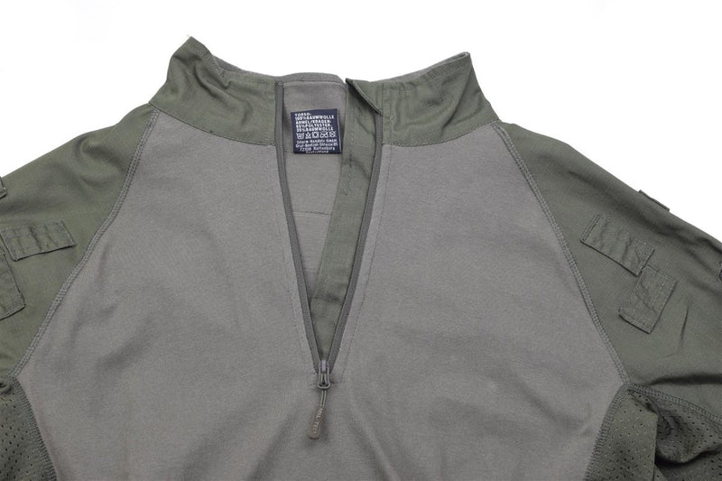 Close-up of olive Mil-Tec military style tactical combat shirt with partial front zipper and reinforced stitching