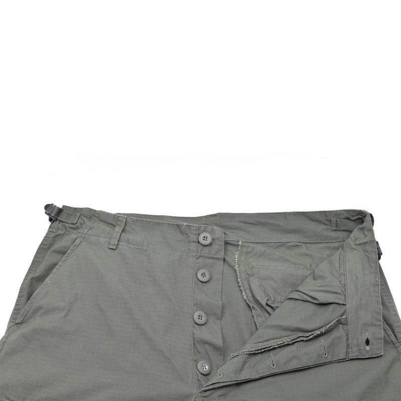 U.S. Army style olive drab prewashed ripstop Bermuda shorts with button fly and multiple pockets visible