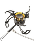 Black foldable Optimus Polaris camping stove with fuel hose and pot supports extended on white background