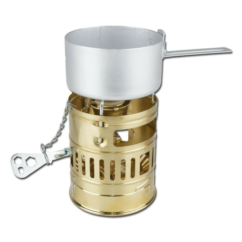 Compact brass Optimus Svea liquid fuel camp stove with pot and handle for outdoor cooking and hiking.