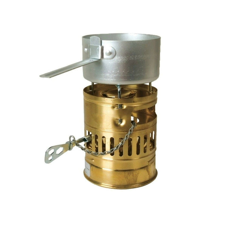 Compact brass Optimus Svea liquid fuel camp stove with aluminum pot and foldable handle for outdoor cooking.