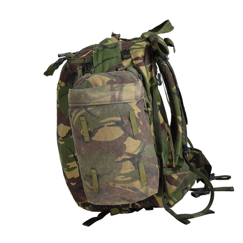 Original British Military tactical DPM backpack in camouflage with padded straps for hiking, camping, and travel use.