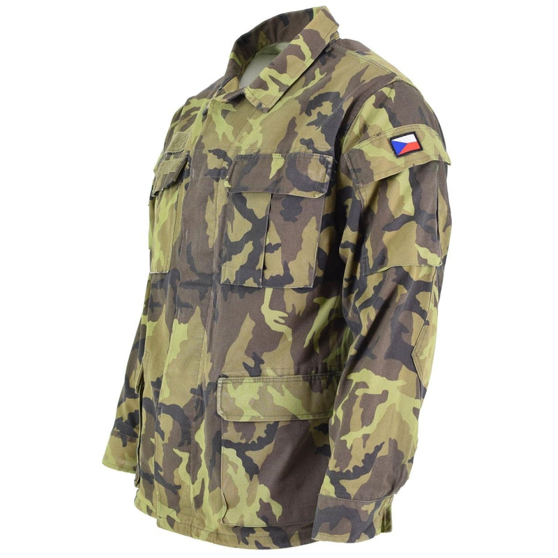 Original Czech army field jacket with leaf camo pattern and Czech flag patch on the arm, multiple front pockets.
