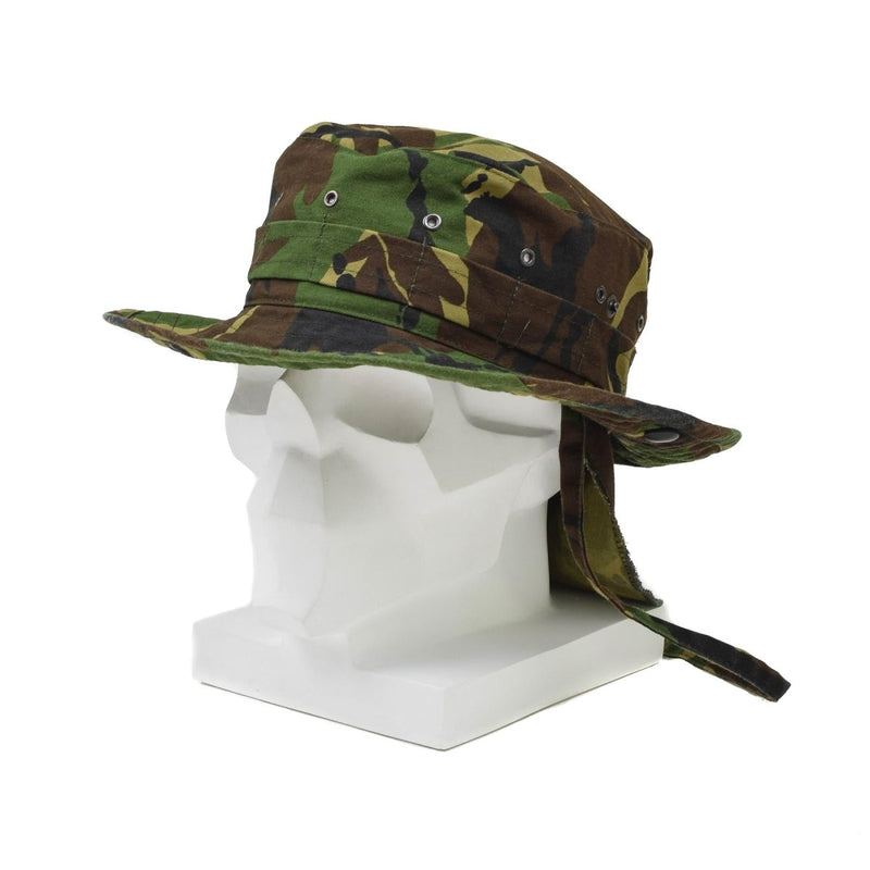 Dutch military DPM boonie hat with wide brim and detachable neck flap in woodland camouflage pattern on mannequin head.