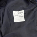 Close-up of quinched lining and care instruction label inside original Dutch military women's blue trench coat