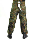 Original German army Flecktarn GoreTex bib and brace rain trousers with camouflage pattern and adjustable straps.