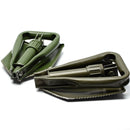 Compact original German BW Army folding shovel in green, durable for survival and outdoor use.