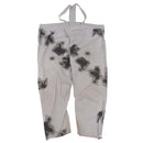 Original German military snow camouflage pants with elastic braces designed for winter outdoor activities and cold weather.