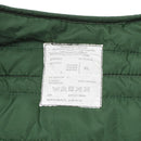 Close-up of size XL white label with Greek text and care symbols on green Original Greek military M65 liner jacket