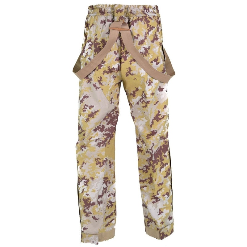 Original Italian Air Forces desert camo bib rain pants with adjustable suspenders and elastic waist for outdoor durability.