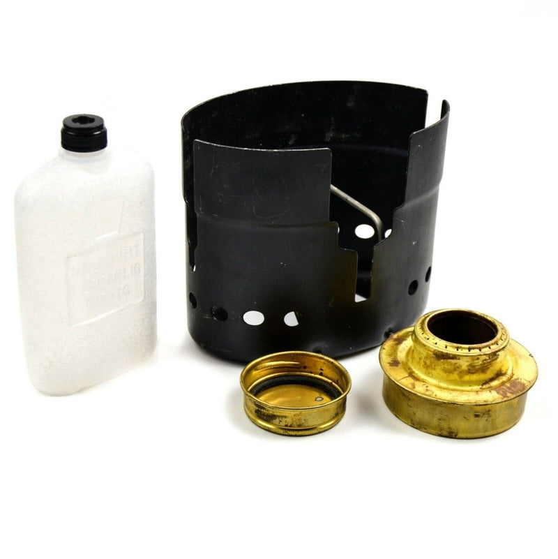 Original Swedish army Trangia SVEA spirit burner camping stove with brass burner, stove base, and plastic fuel bottle kit