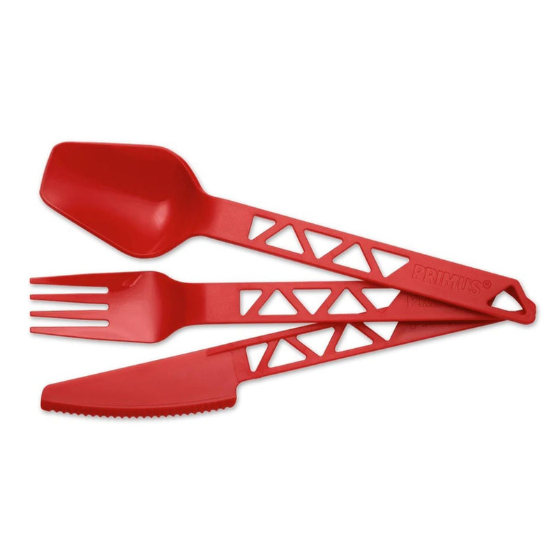 Red lightweight plastic camping cutlery set with spoon, fork, and serrated knife for outdoor use