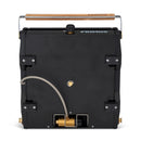 Compact Primus Moja outdoor camping stove with gas burner, wooden handle, and durable black metal body for hiking kitchens.