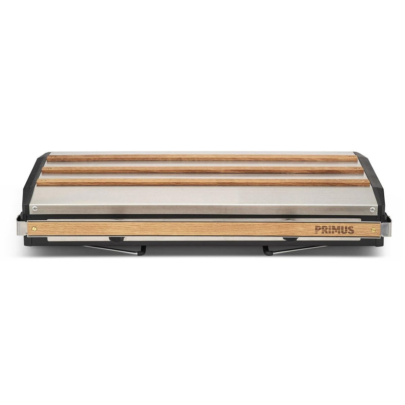 Folded Primus Tupike dual gas burner portable outdoor camping stove with wood and metal design