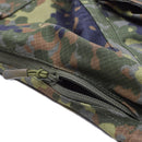 Close-up of TACGEAR German Flecktarn camo smock jacket showing YKK zipper on durable ripstop fabric.