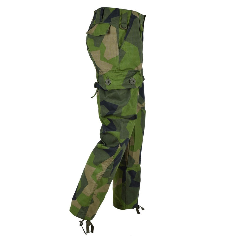 TACGEAR Swedish military combat pants in splinter camo with cargo pockets and adjustable leg ends for cold weather use